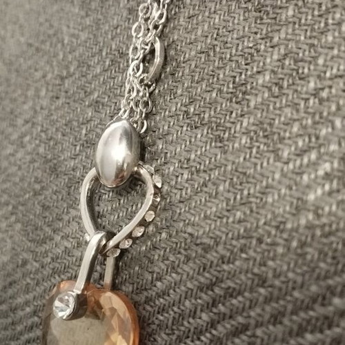 Modern necklace with double chain and heart pendant in amber tone, like new