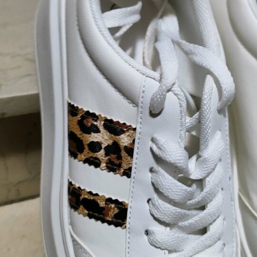Sneakers white Tsoukalas Shoes like new, size 39 with animal print details