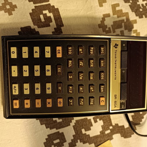 Texas Intsruments SR-50A calculator used with charger and leather case