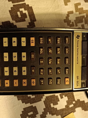 Texas Intsruments SR-50A calculator used with charger and leather case