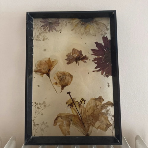 Wooden frame with dried flowers like new