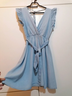 Light blue dress size M used with belt and V neckline