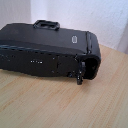 Canon camera used with battery door issue