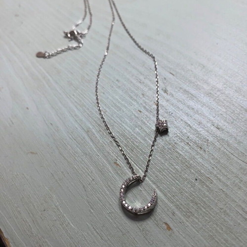Silver pendant necklace with zircon stones, moon and star design, new