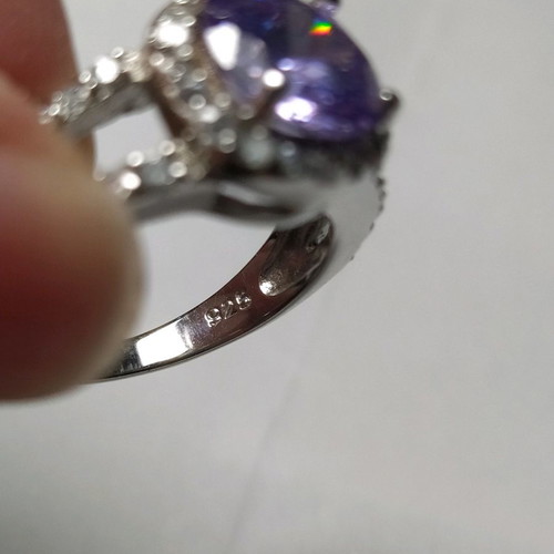 Silver (925) ring new with purple stone and smaller stones