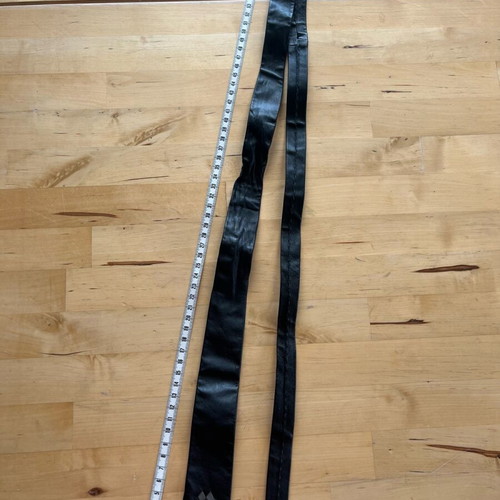 Leather black tie used with gray detail