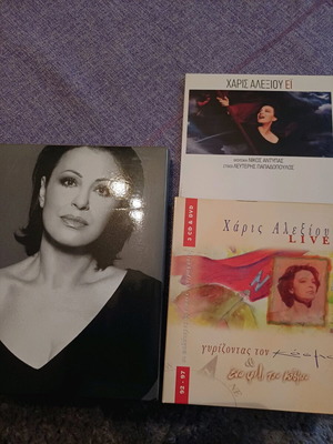 Luxury hardcover box sets and concert CD like new