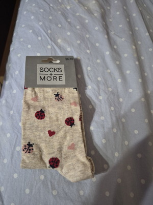 Socks new with ladybug and heart pattern