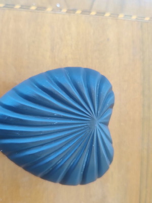 Black heart-shaped box used with small cracks