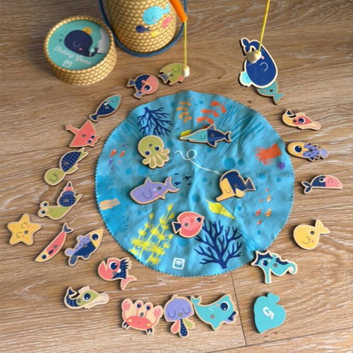 Fishing game used with wooden magnetic rods and numbered fish