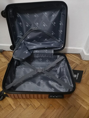Small suitcase new, gold color
