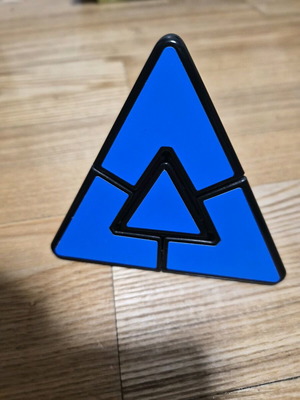 Meffert’s Pyraminx like new triangular Rubik-type cube