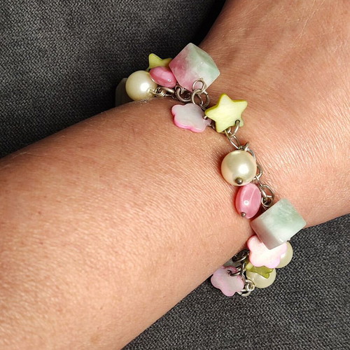 Charm bracelet in pastel pink, mint and white shades like new