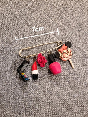 Safety pin with colorful handmade polymer clay charms like new