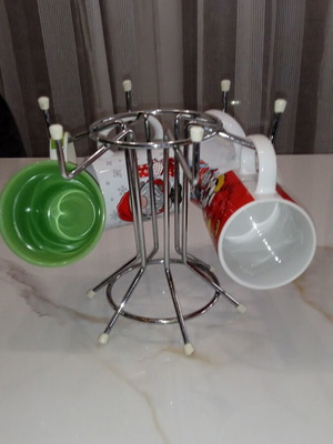 Metal mug holder used, 4 or 6 positions with four mugs