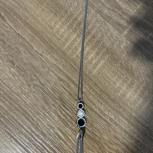 Long necklace with geometric design and tassel, black and silver