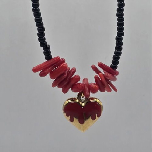 Handmade necklace with steel heart, black beads and red coral