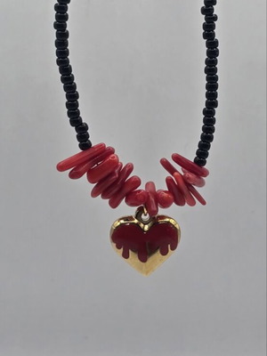 Handmade necklace with steel heart, black beads and red coral