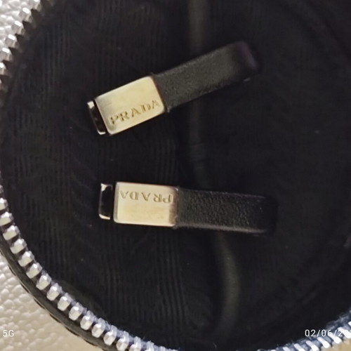 Prada cufflinks with leather zip case like new, black metal and leather