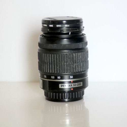 Pentax K10 DSLR camera used with lenses and case