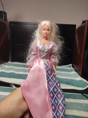 Doll with beautiful dress used