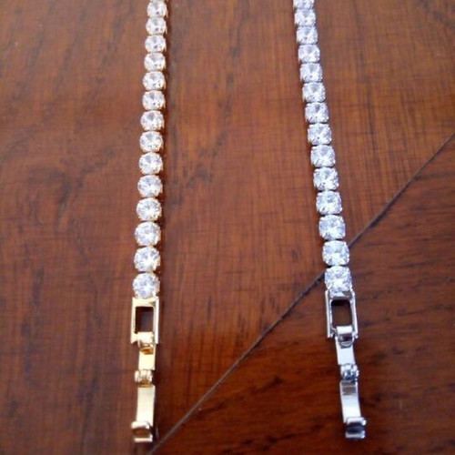 Riviera bracelet new, gold and silver with zircon stones, 18cm