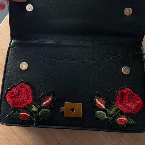 Leather shoulder bag like new, black with multicolor details