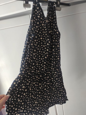 Sleeveless jumpsuit like new, dark blue with polka dots