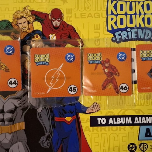 Koukouroukou DC sticker album with 12 sealed stickers