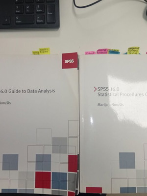 SPSS Statistics Manual like new, two volumes with CDs