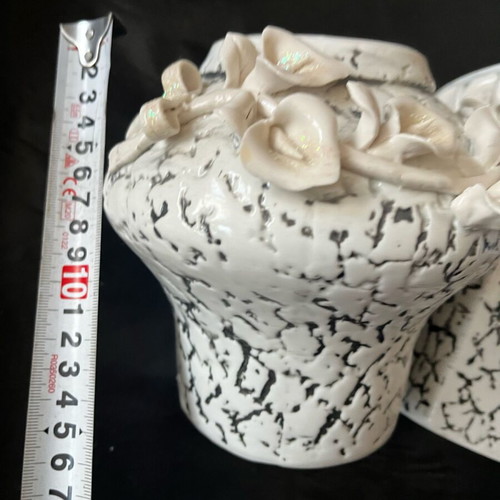 Ceramic vase new with embossed flower and curved detailed design