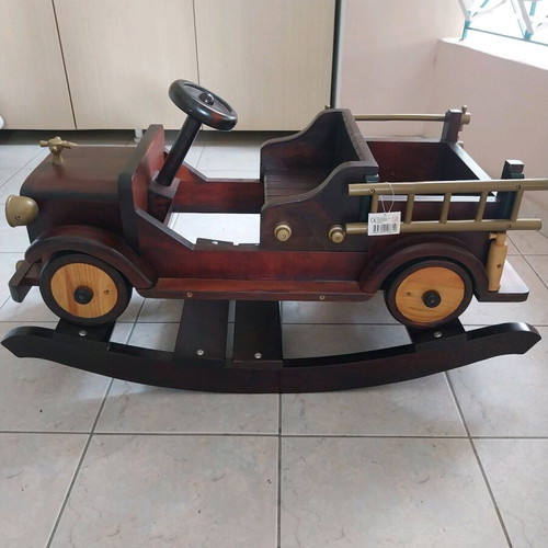 Rocking wooden car made of beech and pine