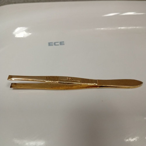 French vintage tweezers used, likely gold-plated from Nogent