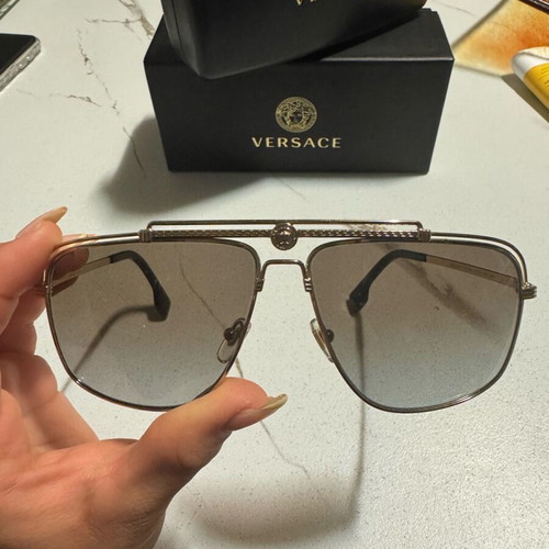 Versace Sunglasses like new, gold men's