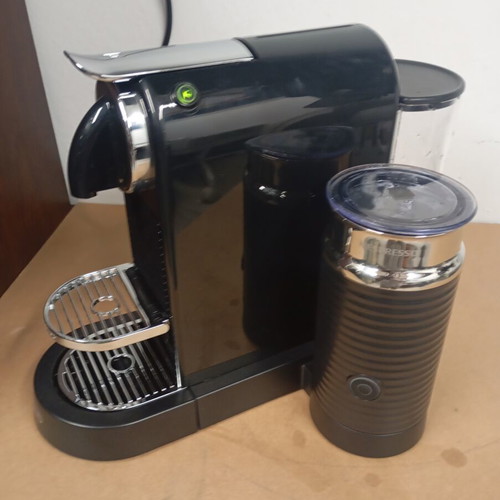 Delonghi Nespresso coffee machine with milk frother