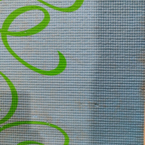 Exercise mat used with visible signs of wear