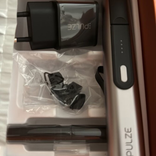 Pulze device new with charger, case, cover, cleaning tool and USB cable