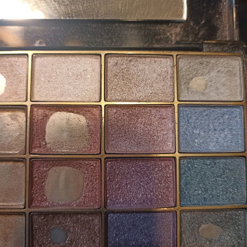 Eyeshadow palettes used, 2 pieces, one large and one small