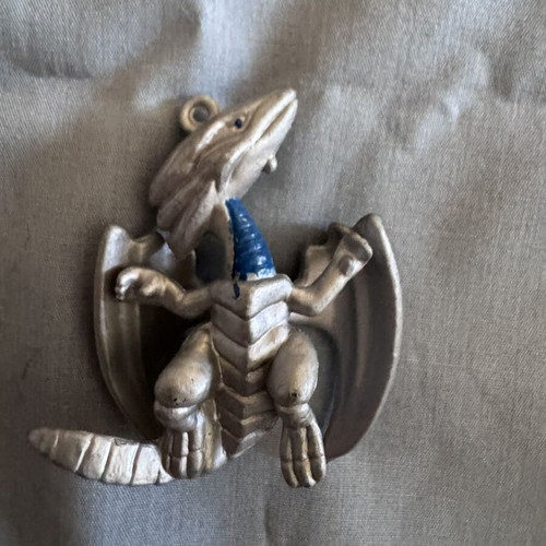 Yu-Gi-Oh White Dragon keychain used, silver and blue