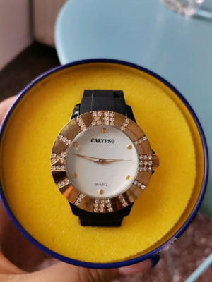 Calypso women's watch like new, black with gold and zircon