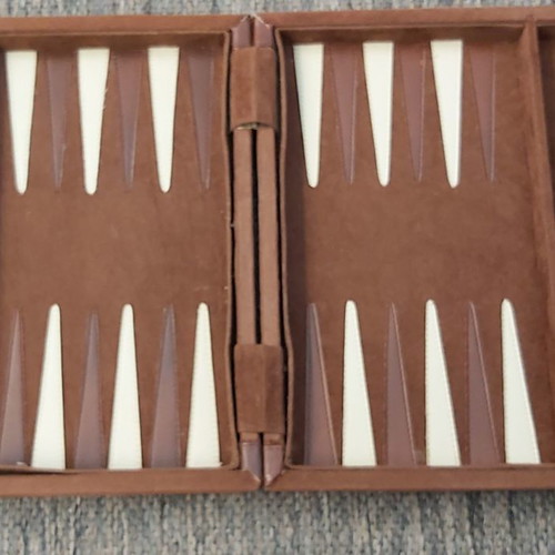 Leather backgammon set used, castor, 1980s case
