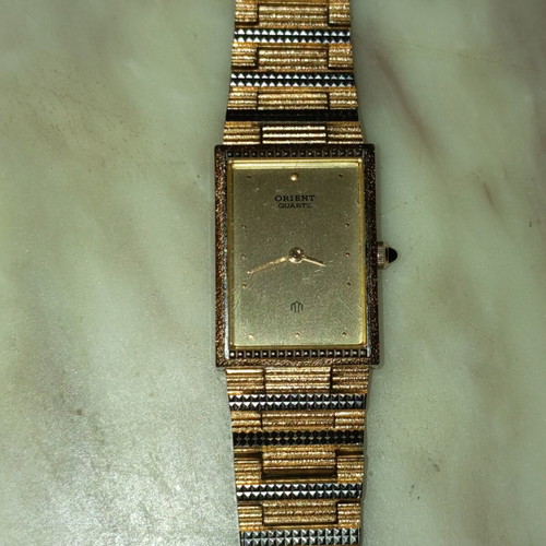 Orient quartz women's watch like new, gold and silver