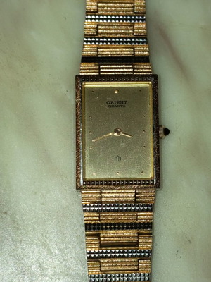 Orient quartz γυναικείο ρολόι σαν καινούργιο, χρυσαφί και ασημί