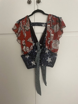 Jerkis vest one size, like new, multicolor with sequins