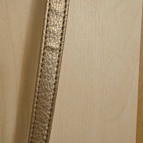 Shoulder bag in metallic gold color like new