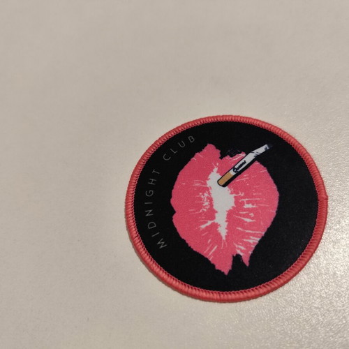 Queens of the Stone Age patch and trading cards set new