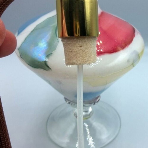Vintage glass perfume bottle with new atomizer