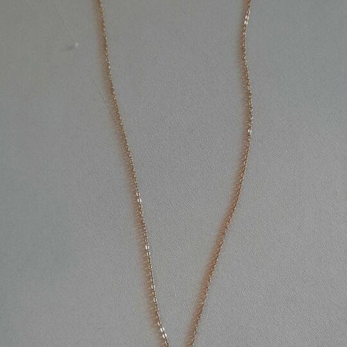 Steel necklace in rose gold with bird motif, used