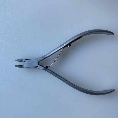 Manicure and cuticle nippers used, various models including Credo Solingen