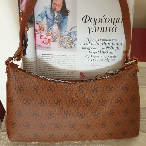 Brown shoulder bag with unique pattern like new